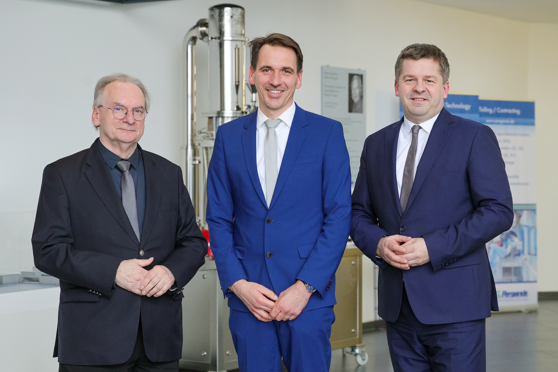 Gruppenfoto von drei Personen